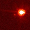 Eris: Massiever dan Pluto